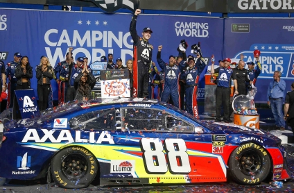    Alex Bowman, driver of the #88 Axalta Camaro ZL1, celebrates his first career Cup series victory with his crew Sunday, June 30, 2019, at Chicagoland Speedway in Joliet, Illinois.